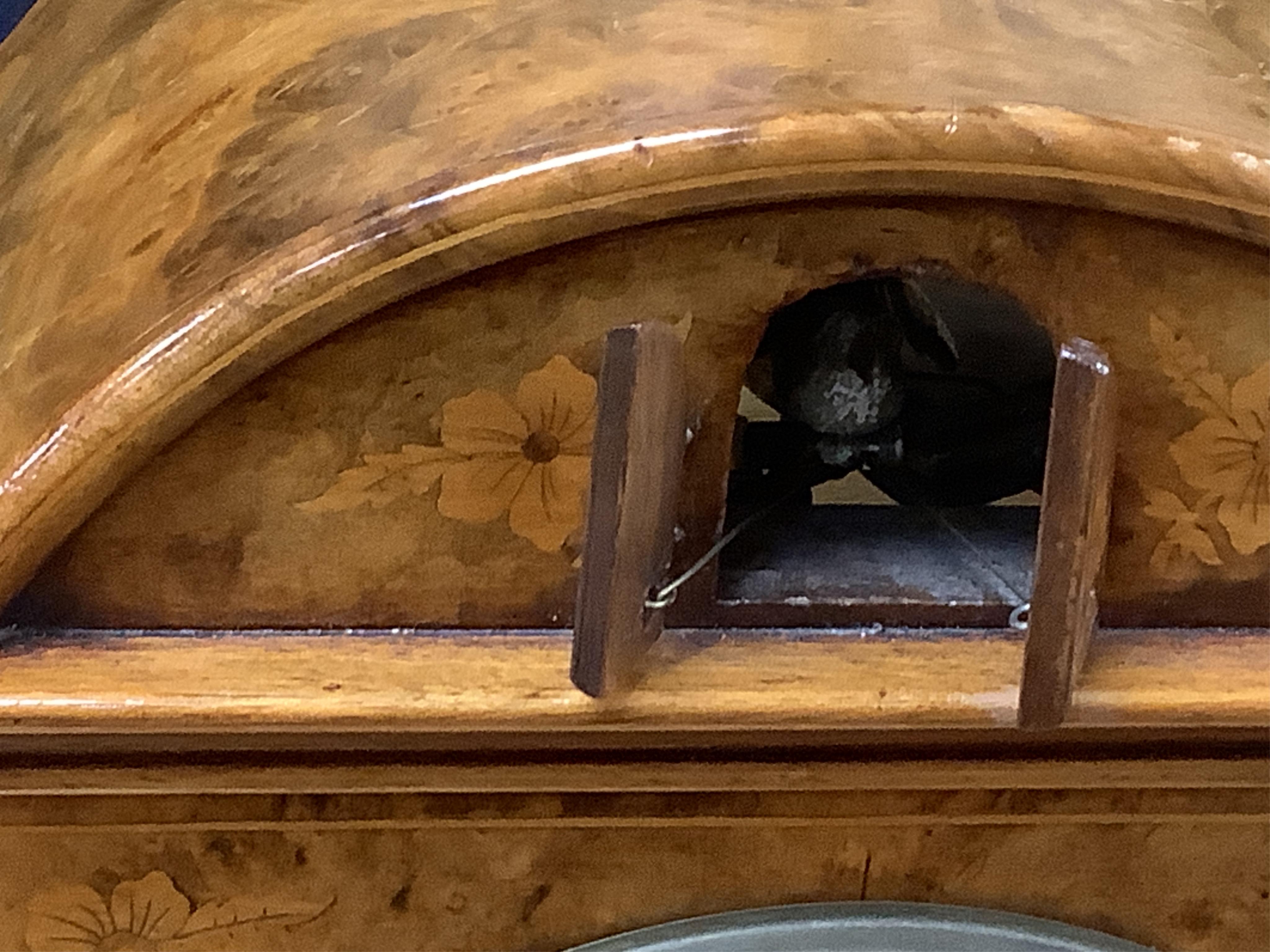 A Victorian burr walnut and marquetry dome topped cuckoo clock, signed Mitchell, London, with oak bracket, 41cm high